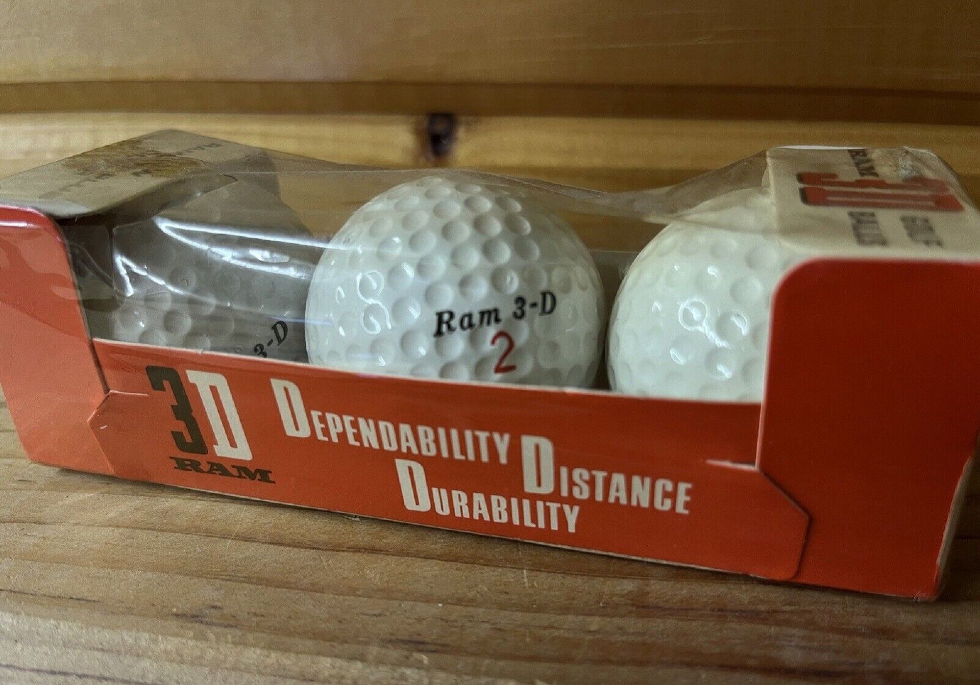 A sleeve of Ram 3D Golf Balls