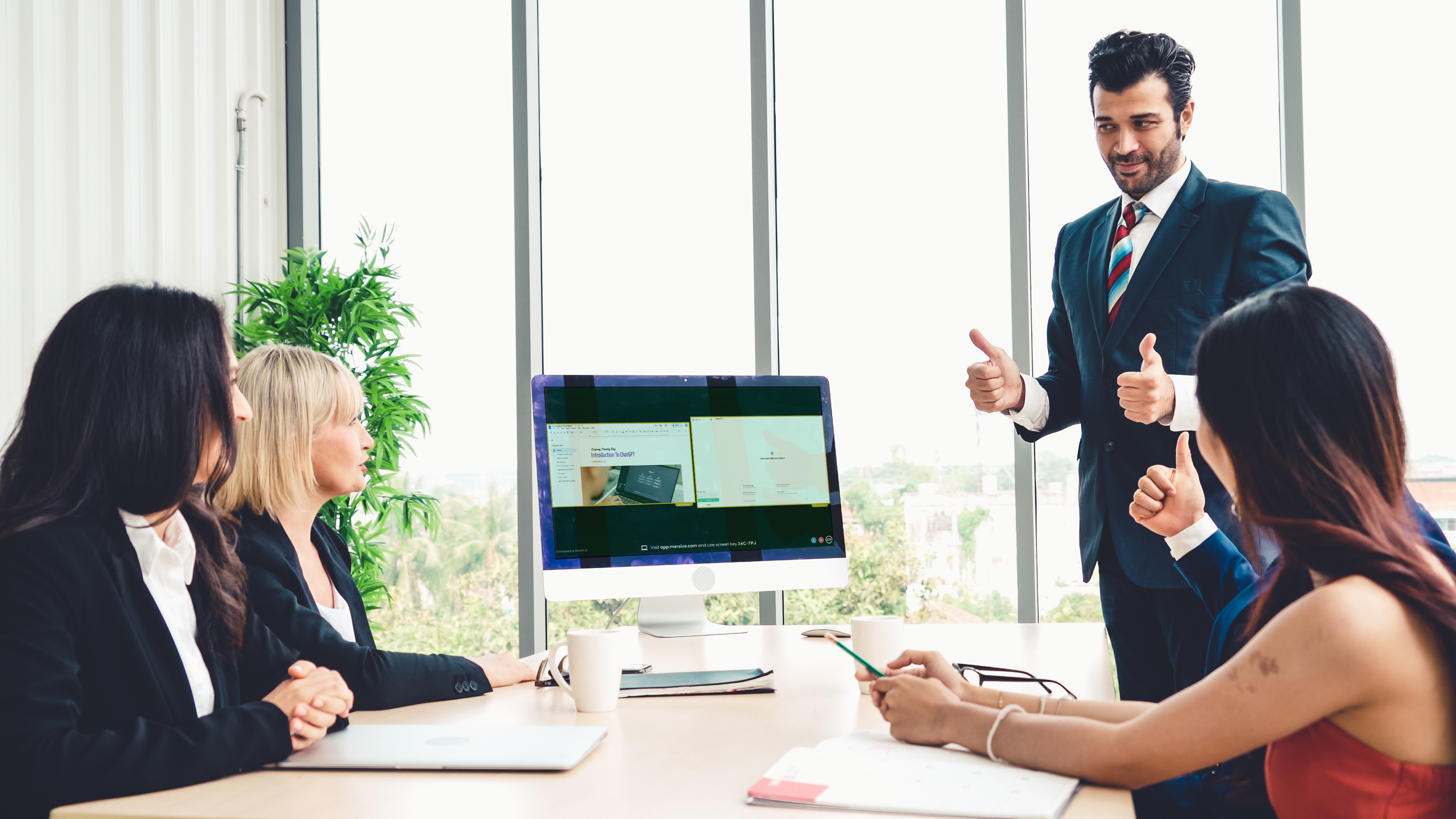 Mersive Collaboration Suite in a four person meeting