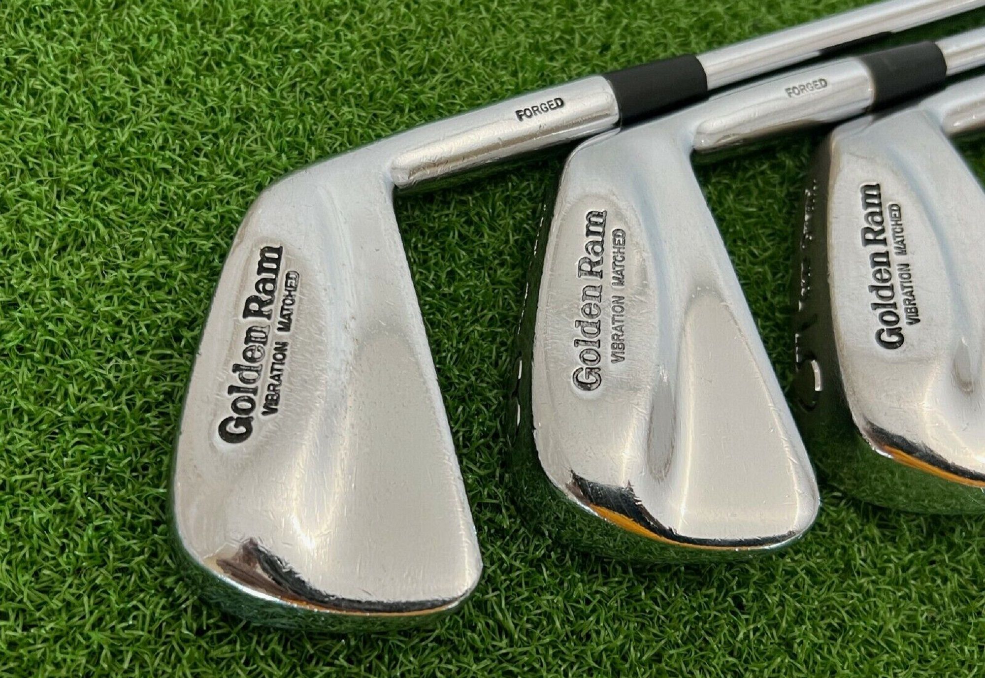 A closeup of Gold Ram Vibration Matched golf irons