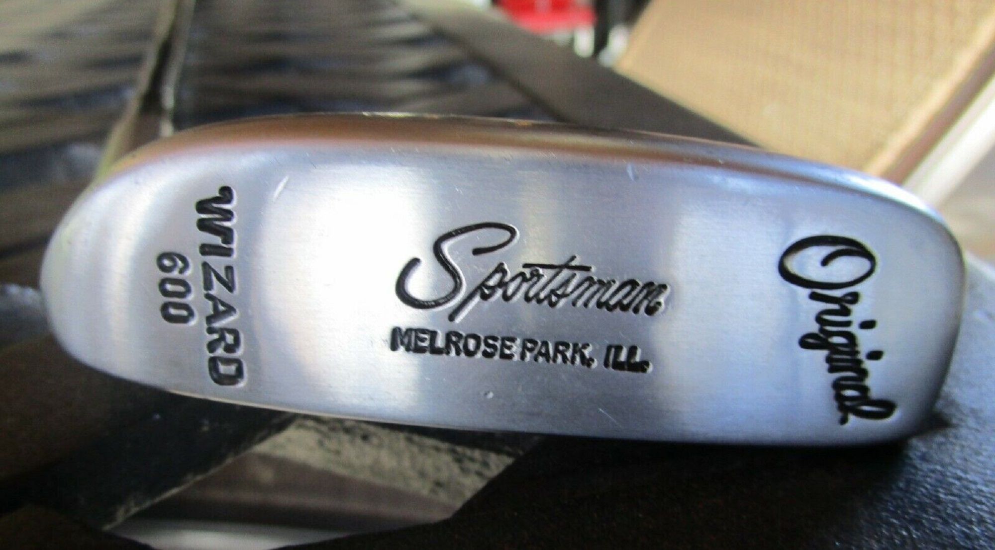 a close up view of a George Low Wizard 600 putter